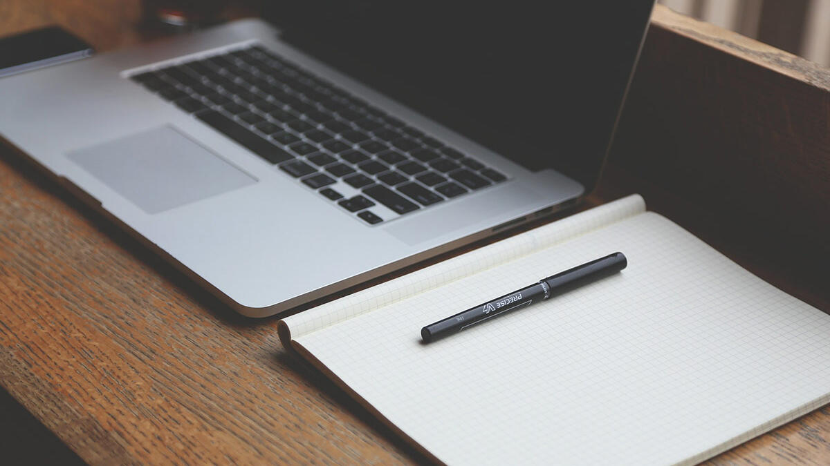 laptop and book