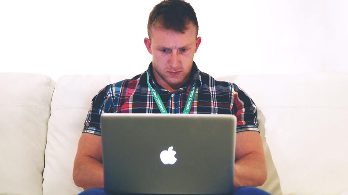 man working on laptop