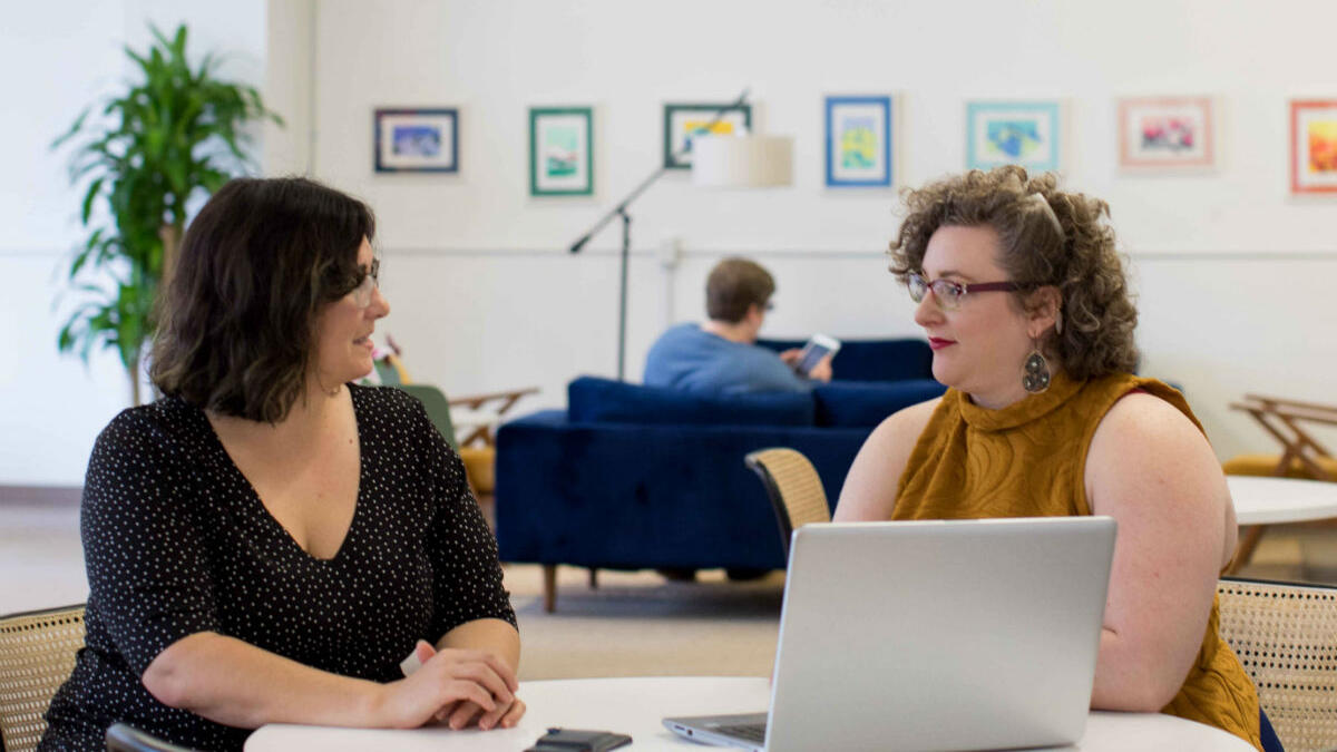 two women in a meeting