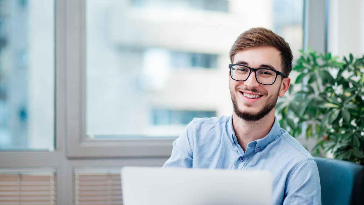 young man working on laptop