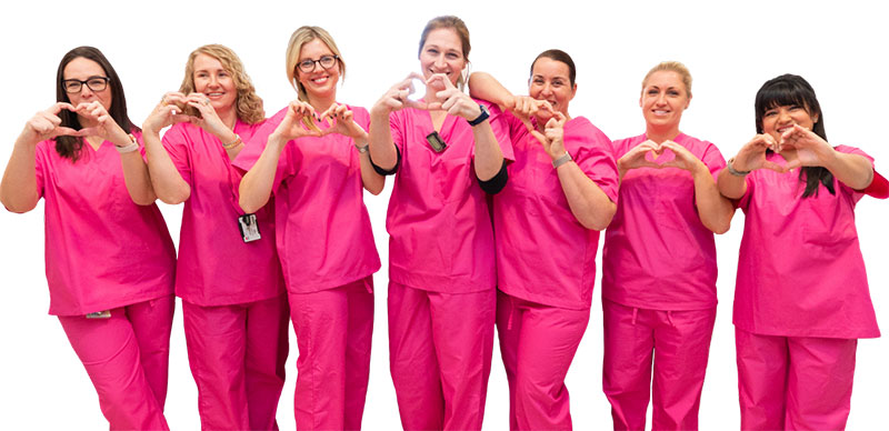 nurses in pink outfits