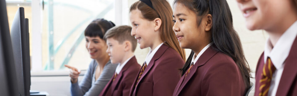 school kids using computers