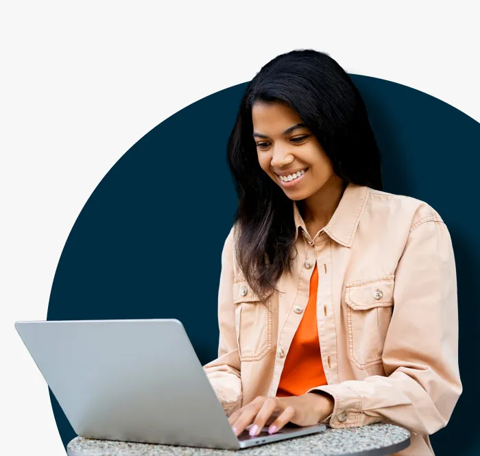 lady in brown shirt marking an online exam