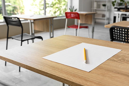 desk with exam paper