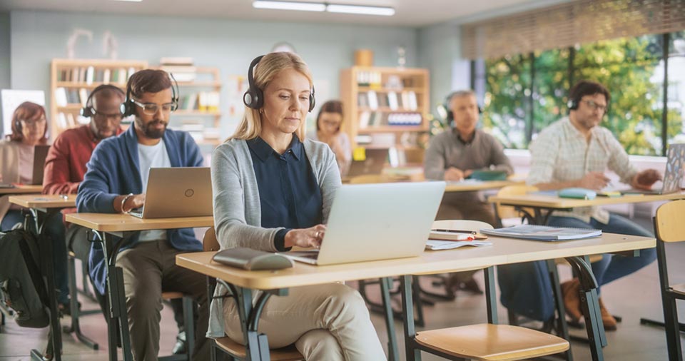 mature students sitting secure online assessments